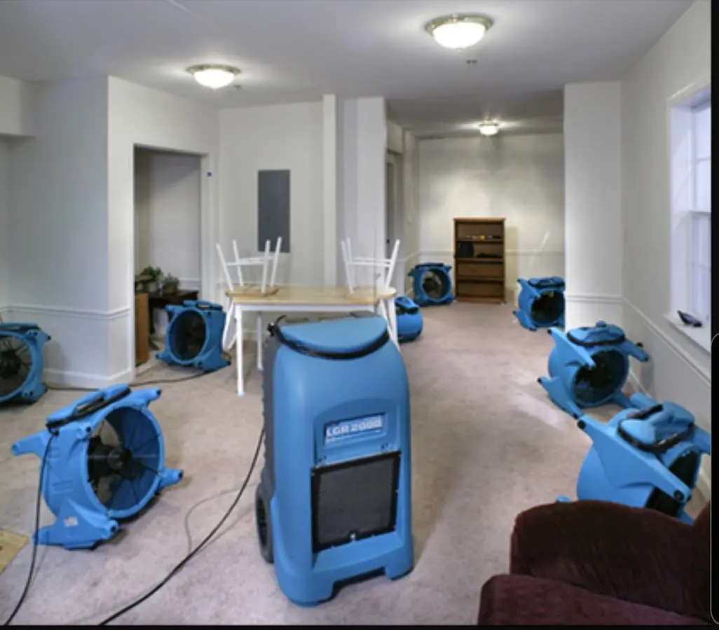 Air movers and dehumidifier setup for Water Damage Restoration in Sterling